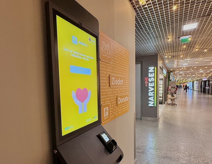Digital Donation Stand Introduced at Riga Airport to Make Giving Easier for Travelers